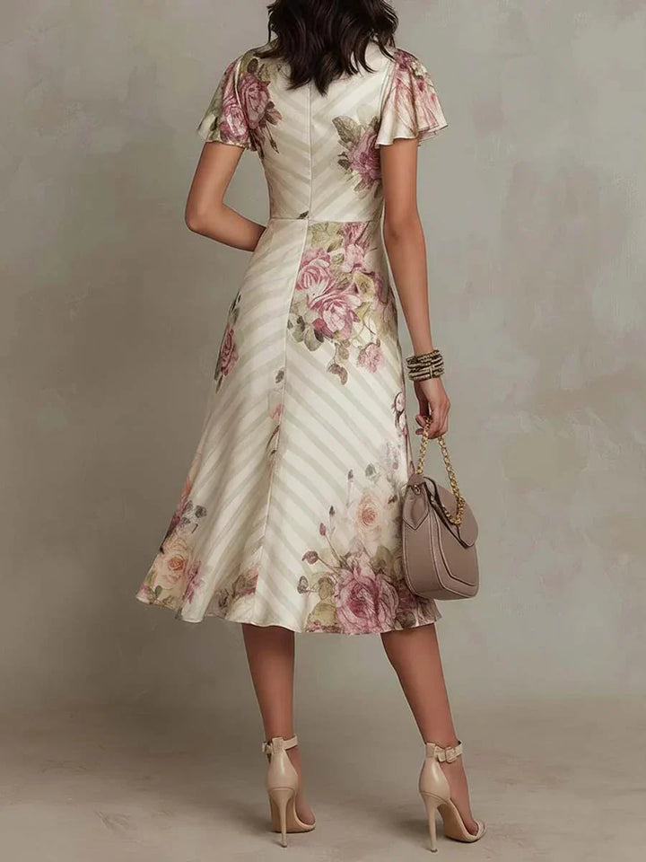 Annabelle | Robe midi cache-cœur froncée à imprimé floral élégant