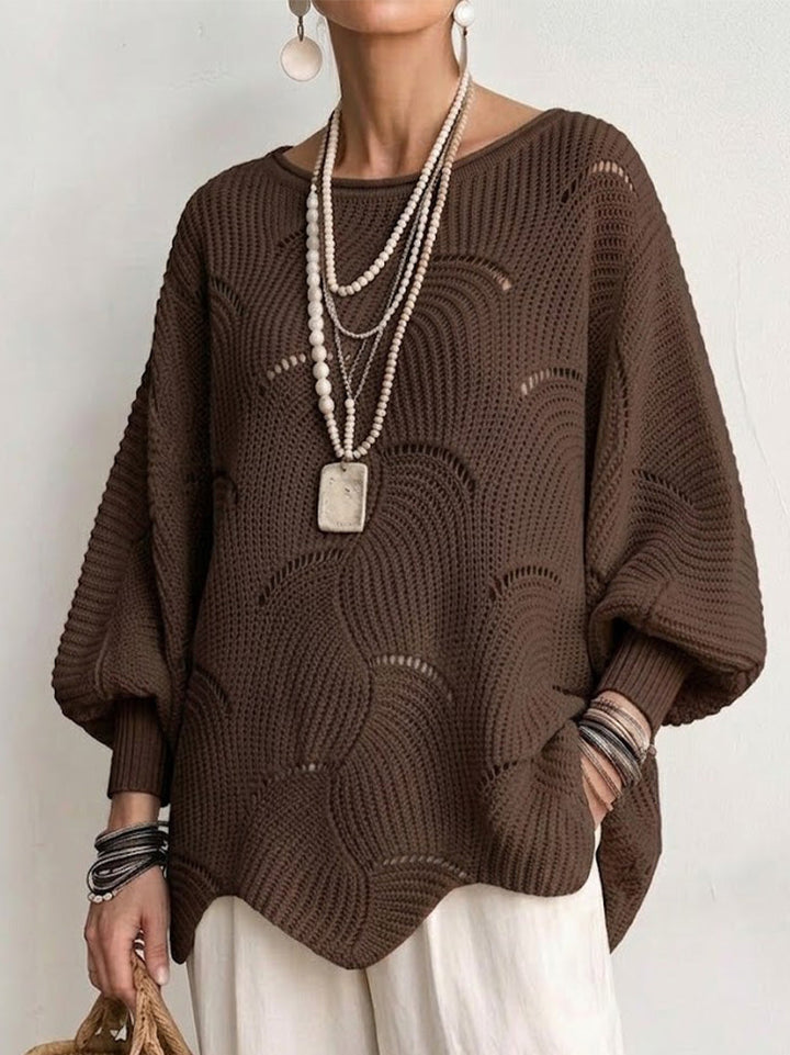 Eve | Pull en maille ajourée à manches chauve-souris