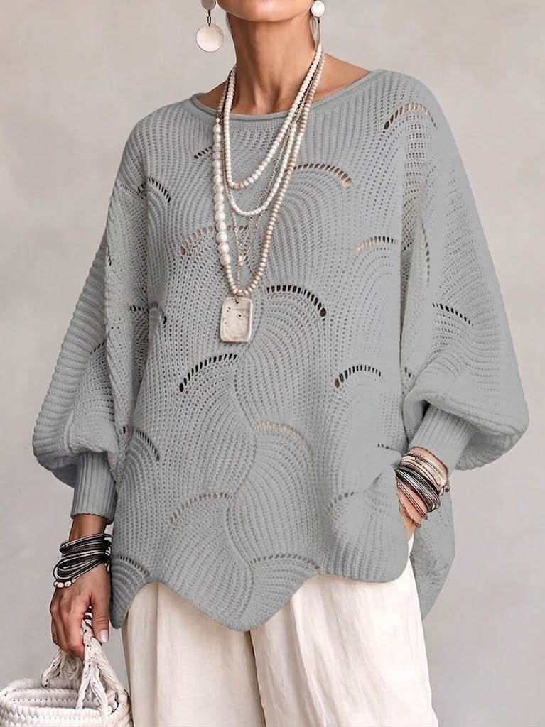 Eve | Pull en maille ajourée à manches chauve-souris
