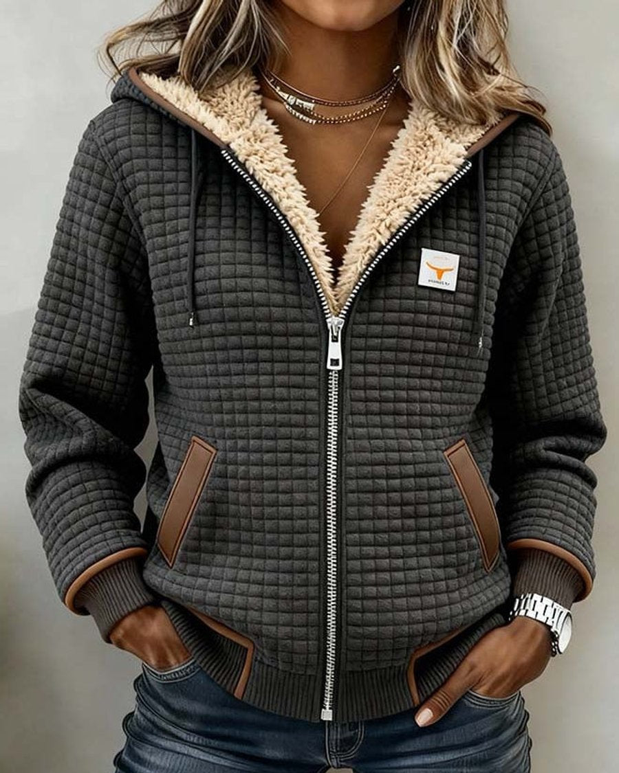 Beth | Veste matelassée à capuche, fermeture éclair et doublure effet peau lainée